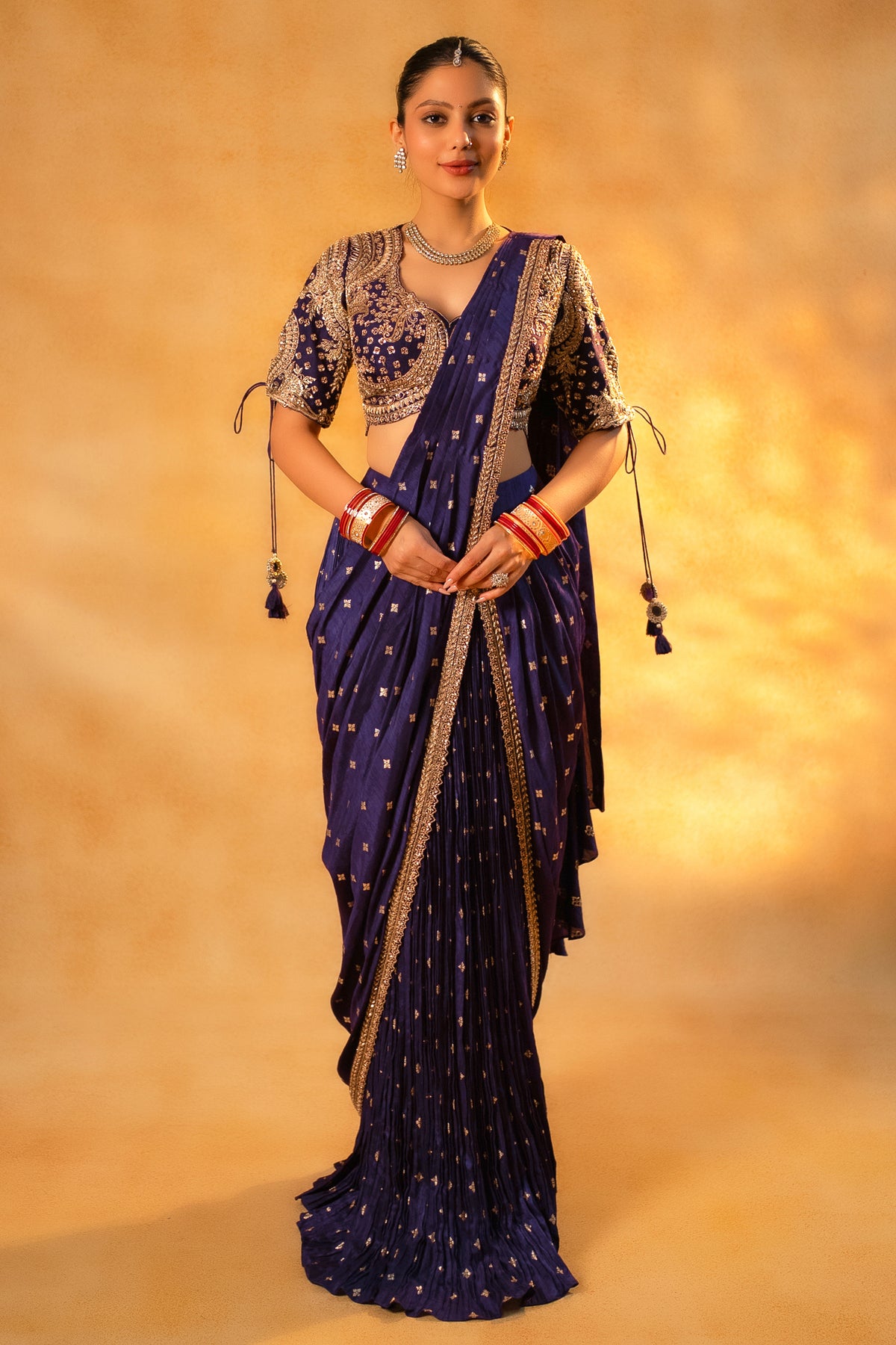 Imperial Plum Purple Raw Silk Saree featuring architectural micro-pleats