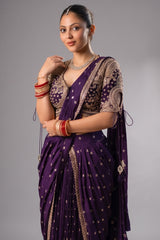 Close-up of the geometric butti weave and zari border on the Imperial Plum Purple Raw Silk Saree