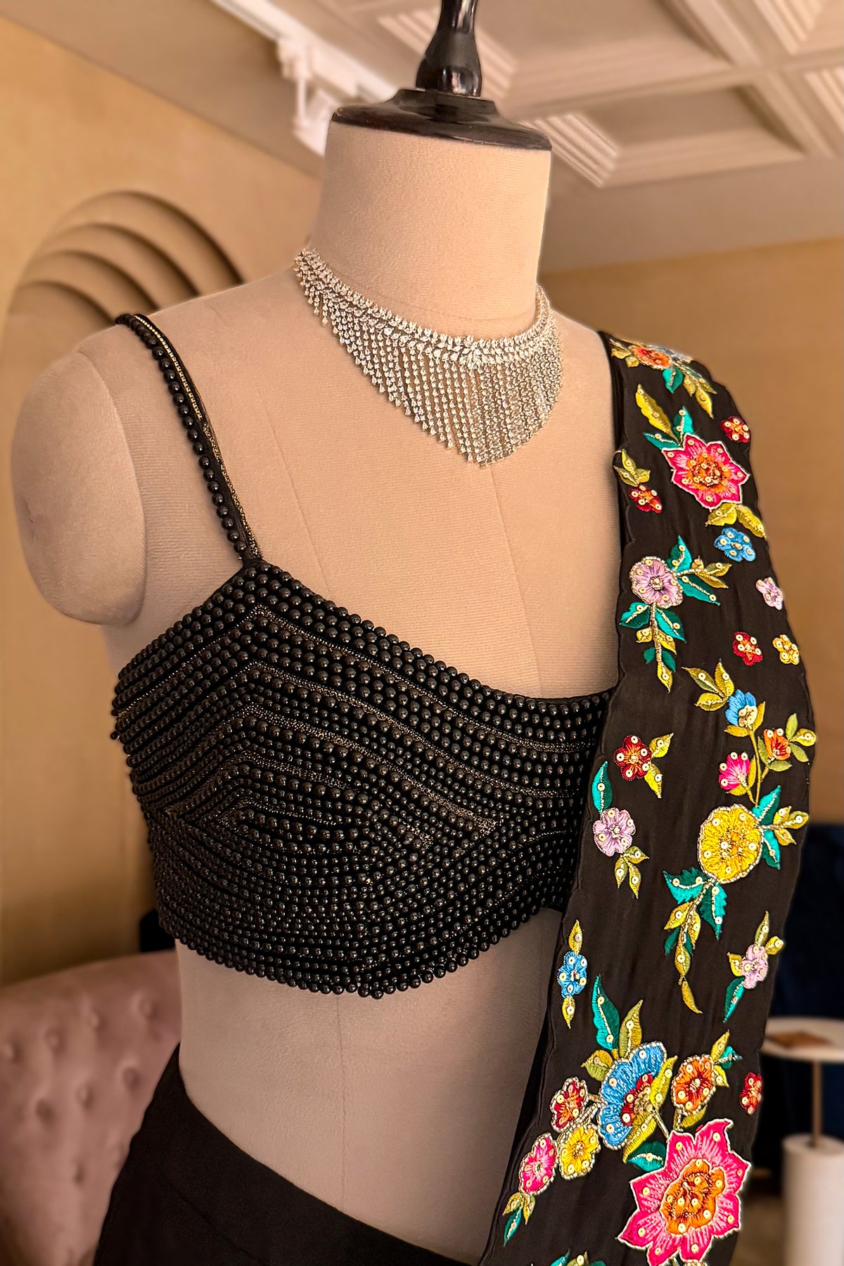 Black Crepe Satin Silk Floral Embroidered Readymade Saree highlighting the pre-stitched liquid-like drape