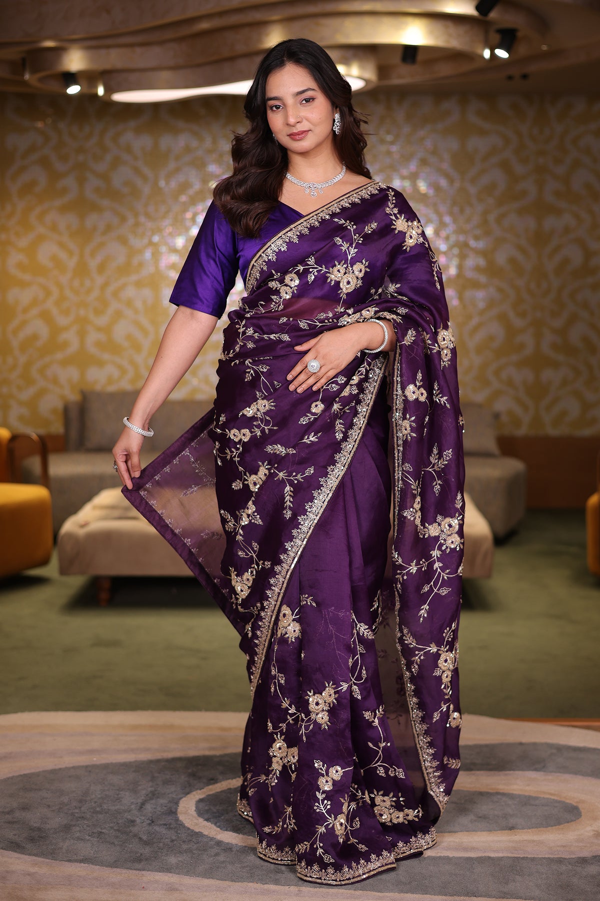 The Deep Purple Organza Saree with All-Over Floral Zari Vines and Cutdana Borders