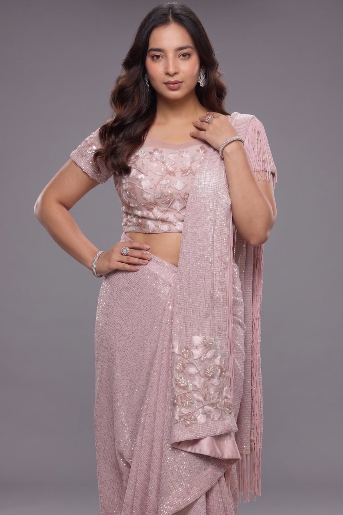 The Rose Pink Sequinned Lycra Net Cocktail Saree with Pallu Fringes and Coordinated Stitched Blouse