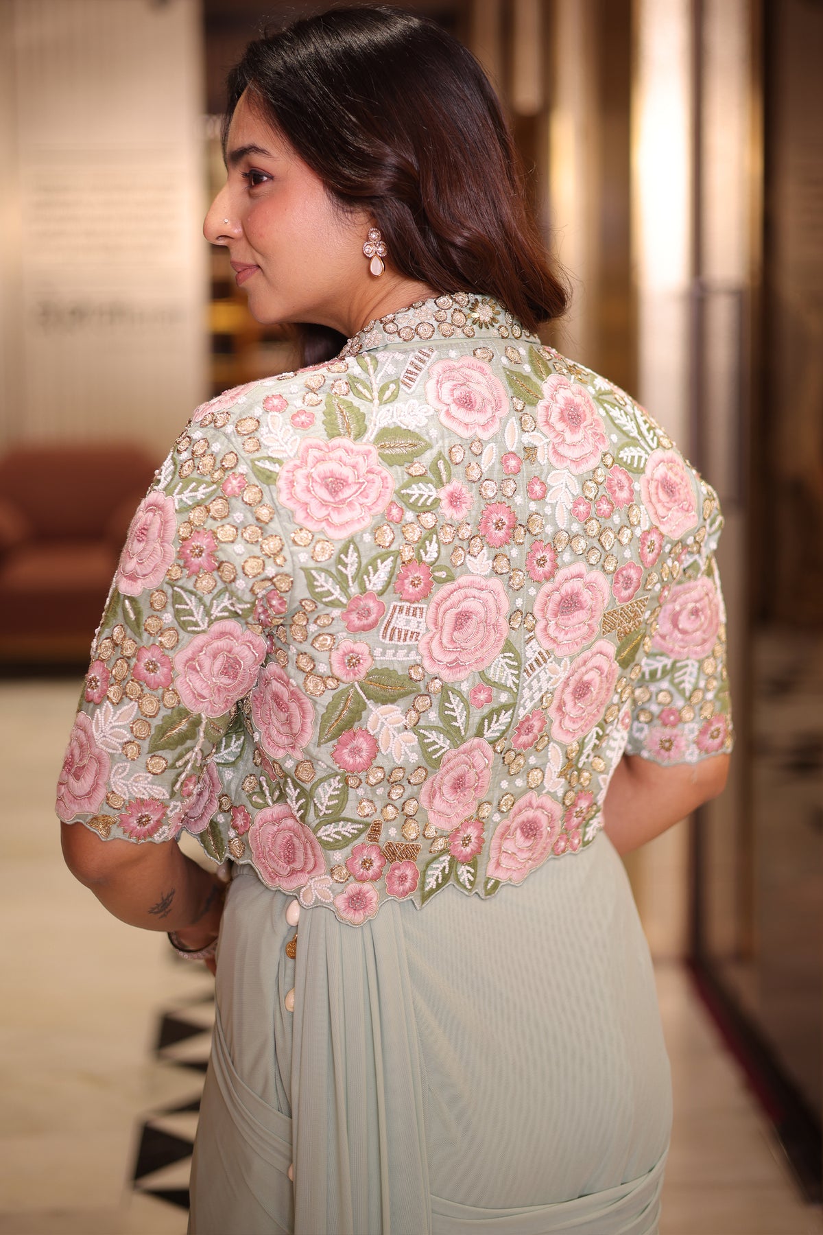 The Mint Sea Green Pre-Stitched Lycra Net Saree with Cowrie Shell Borders and Cape Blouse with Pearl and Bead Floral Embroidery