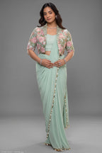The Mint Sea Green Pre-Stitched Lycra Net Saree with Cowrie Shell Borders and Cape Blouse with Pearl and Bead Floral Embroidery