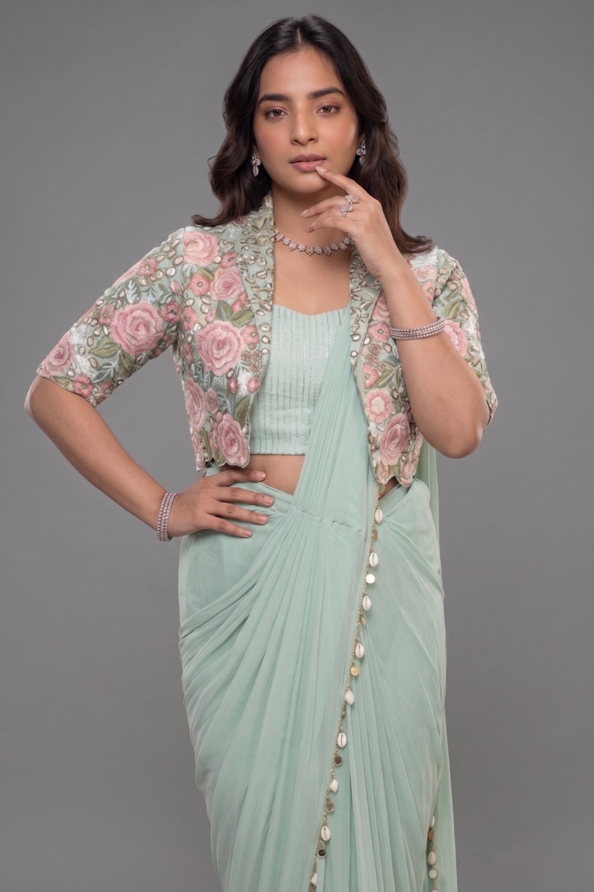 The Mint Sea Green Pre-Stitched Lycra Net Saree with Cowrie Shell Borders and Cape Blouse with Pearl and Bead Floral Embroidery