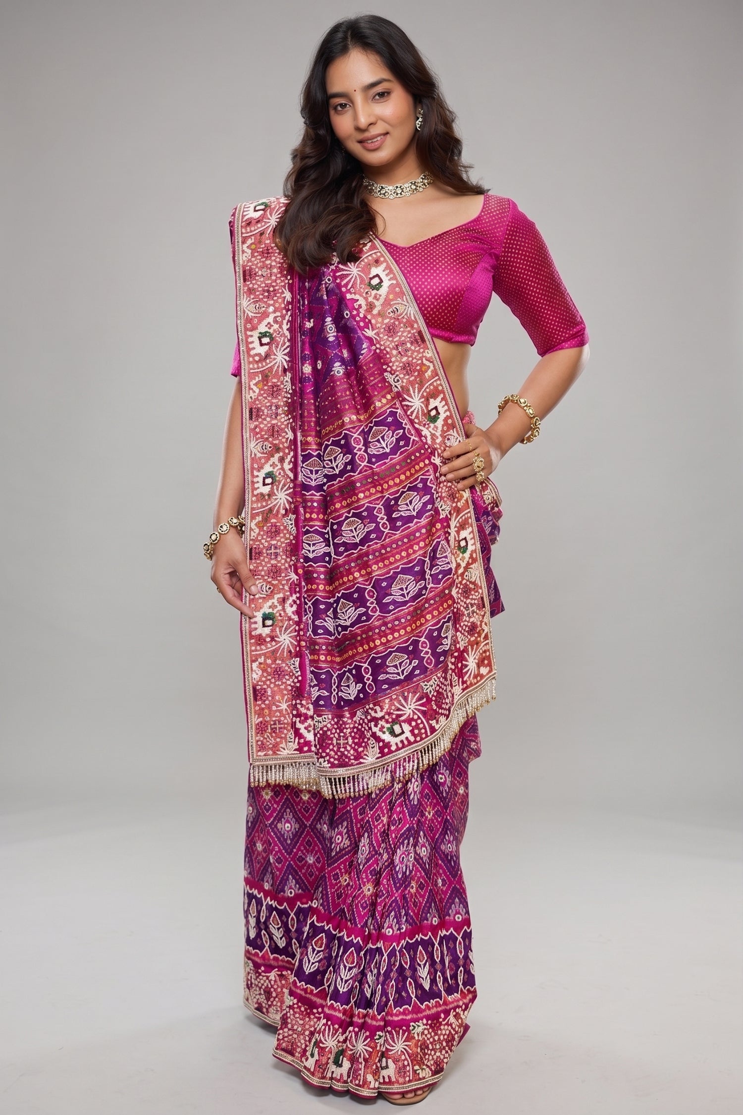 Rani Pink And Purple Silk Saree In Handcrafted Patola Weave With Intricate Bead And Mirror Work Borders Main image