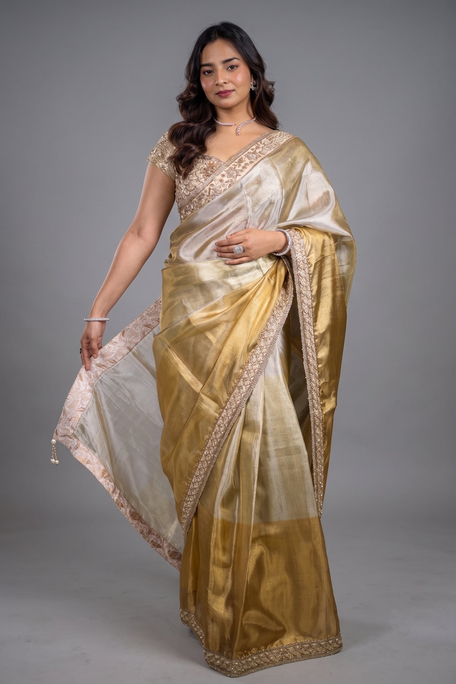 Dual-Tone Silver Golden Tissue Saree Featuring Intricate Handwork Lace Border With Coordinated Heavy Blouse Main image