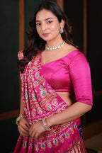 Deep Indigo Purple Gaji Silk Bandhani Saree With Festive Pink Border And Pallu Accented By Intricate Applique And Embroidery