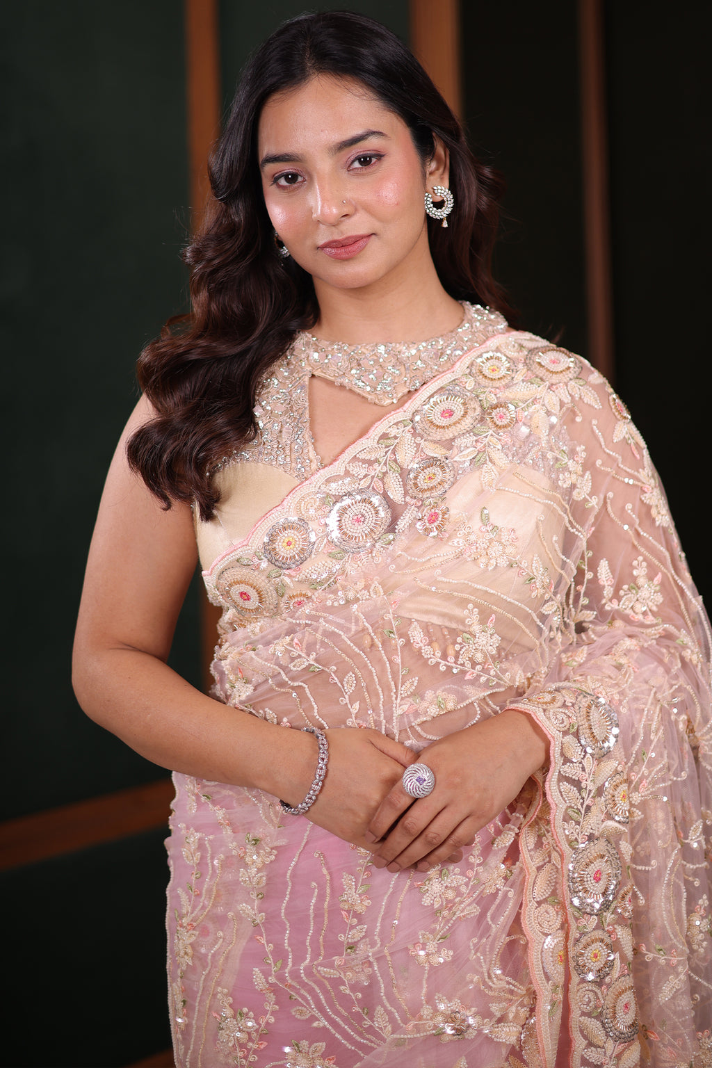 Blush Pink Net Designer Saree Enriched With Glamorous Sequins And Cutdana Hand Embroidery