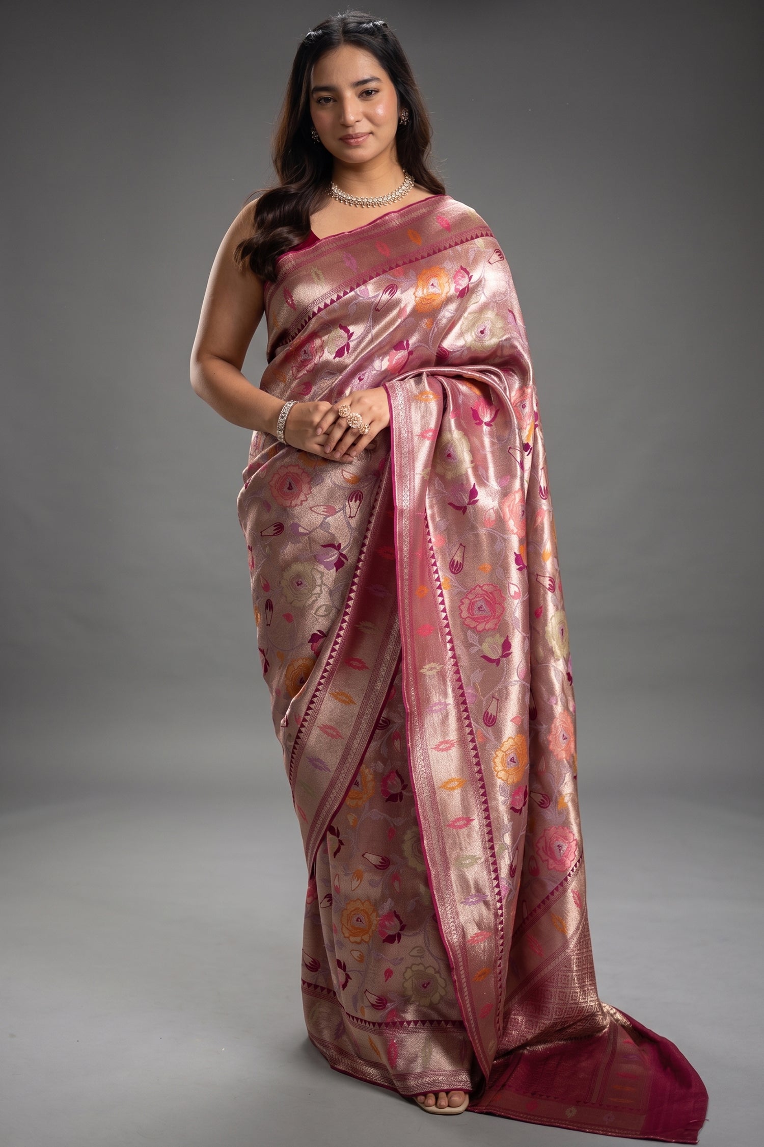 Magenta and Rose Gold Banarasi Tissue Silk Saree Woven With Intricate Floral Meenakari Zari Patterns Main image
