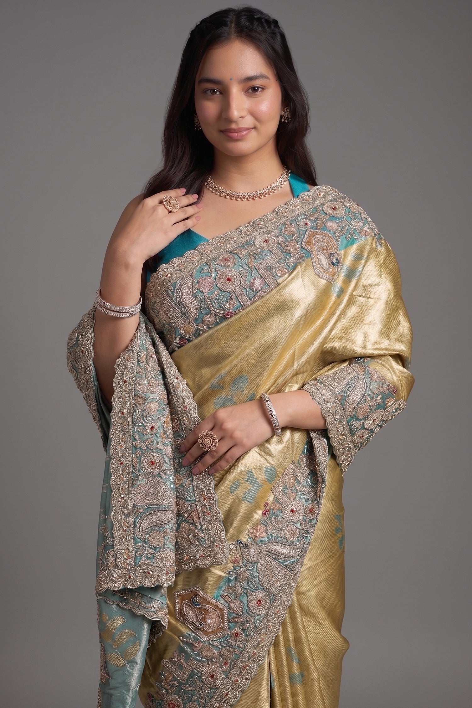 Metallic Olive Gold Tissue Weaving Saree with Contrast Sea Green Border Featuring Heavy Cutdana Bead and Embroidery Secondary image