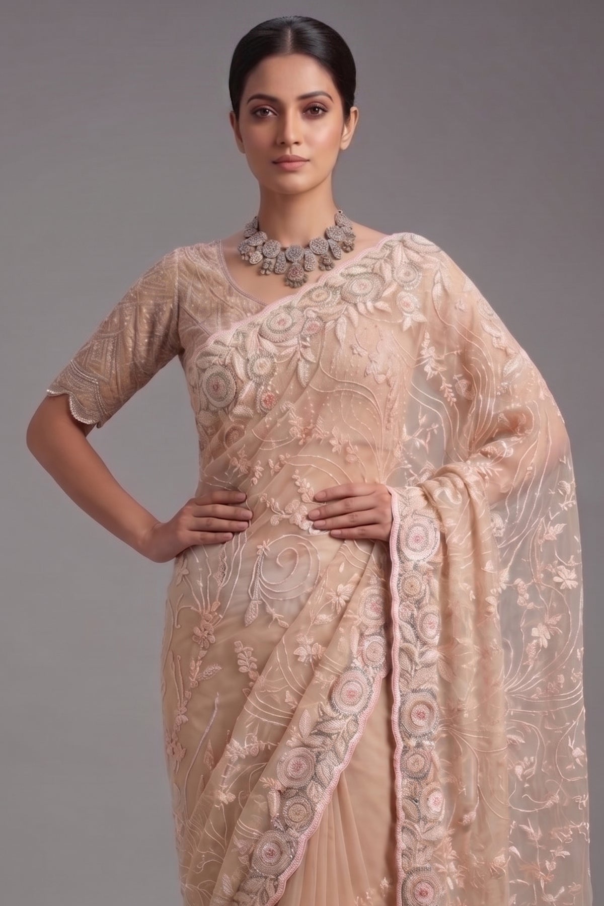 Beige Net Designer Saree Enriched With Glamorous Sequins And Cutdana Hand Embroidery