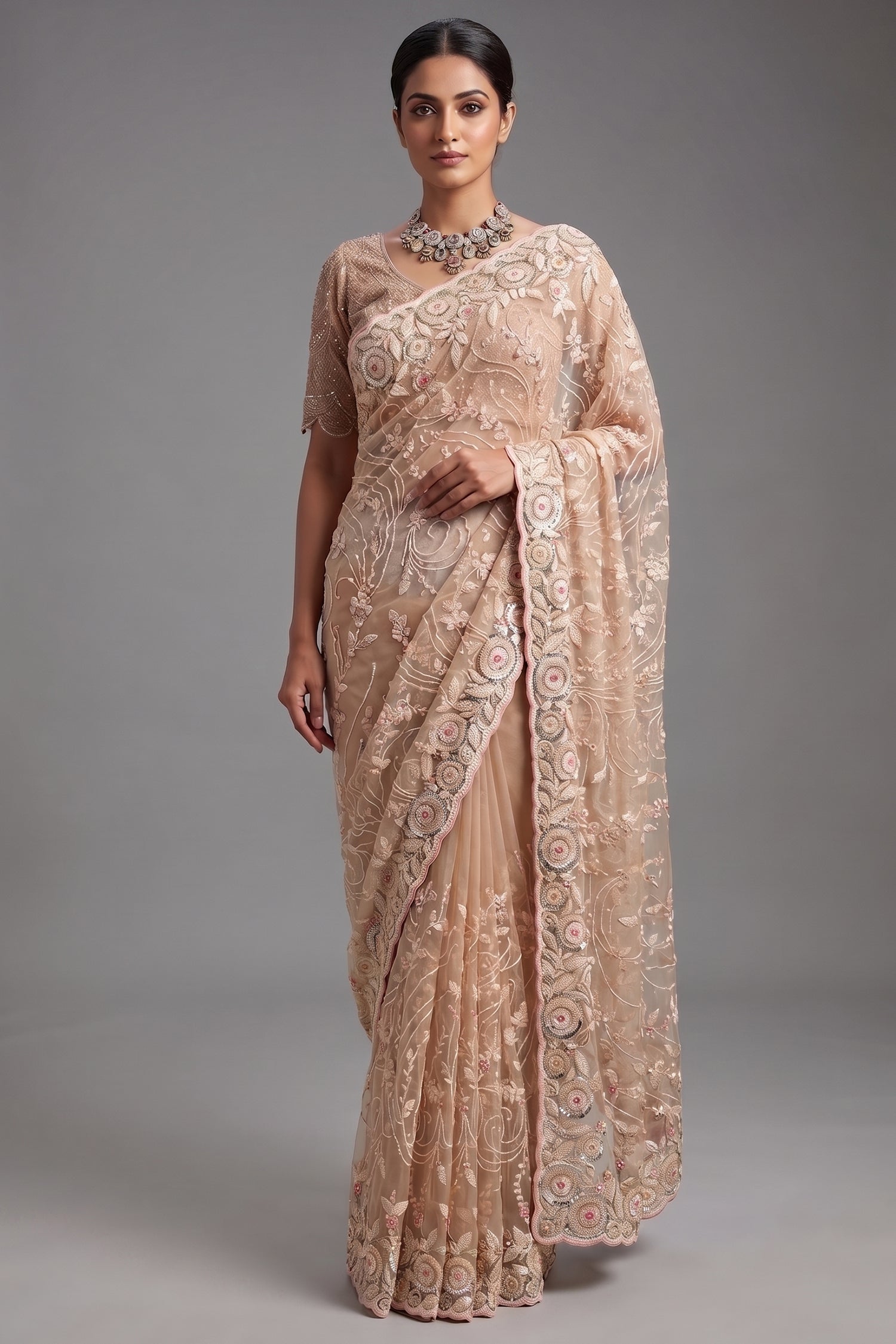 Beige Net Designer Saree Enriched With Glamorous Sequins And Cutdana Hand Embroidery Main image