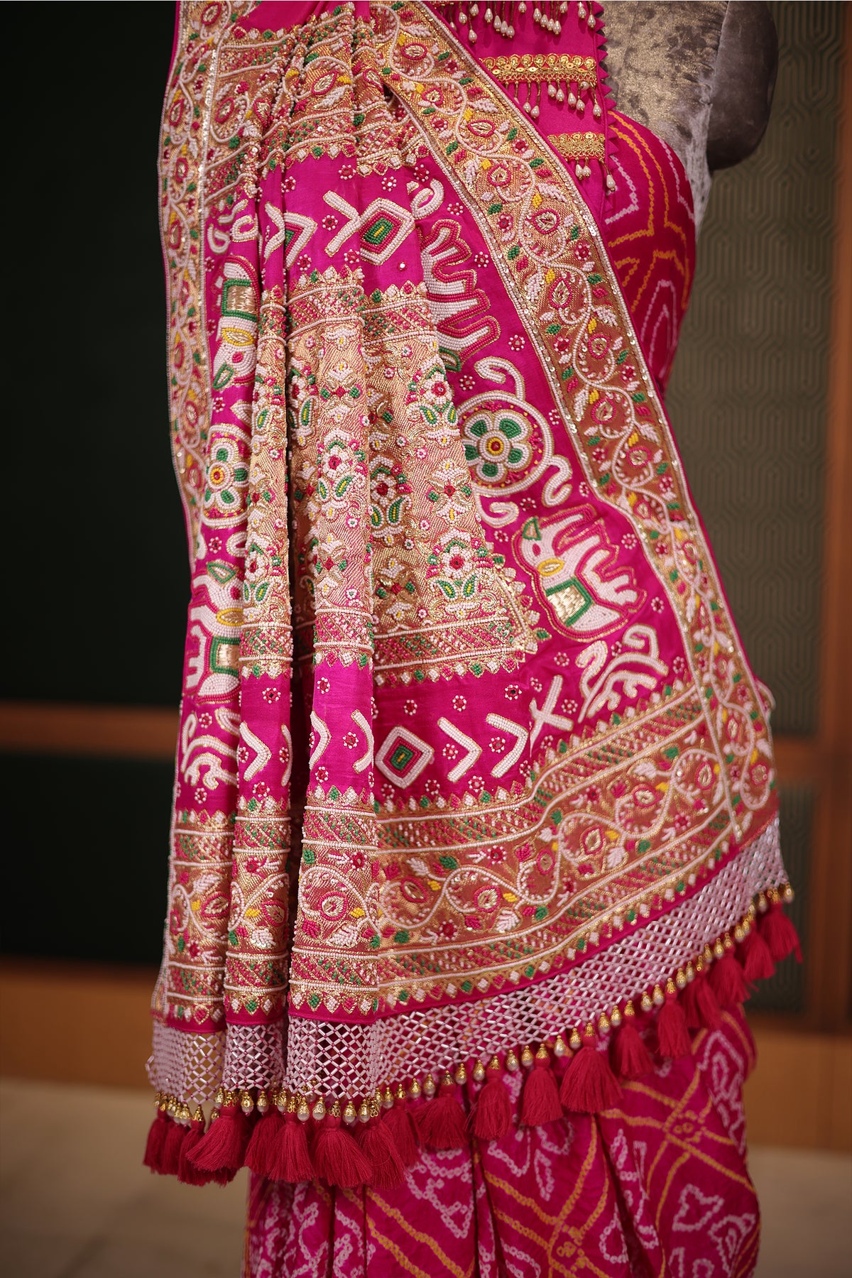 Hot Pink Georgette Bandhani Saree Featuring Beads Zardosi Border with Tassel Detailing
