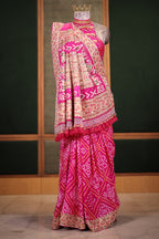 Hot Pink Georgette Bandhani Saree Featuring Beads Zardosi Border with Tassel Detailing