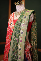 Purple and Red Silk Patola Saree with Traditional Ikat Motifs and Beads Applique Border