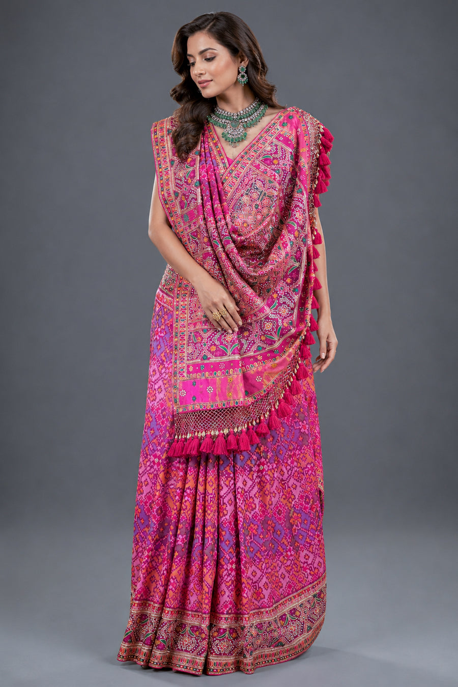 Fuchsia Pink Pure Silk Patola Weave Saree with Ornate Beadwork and Tassel Detailing
