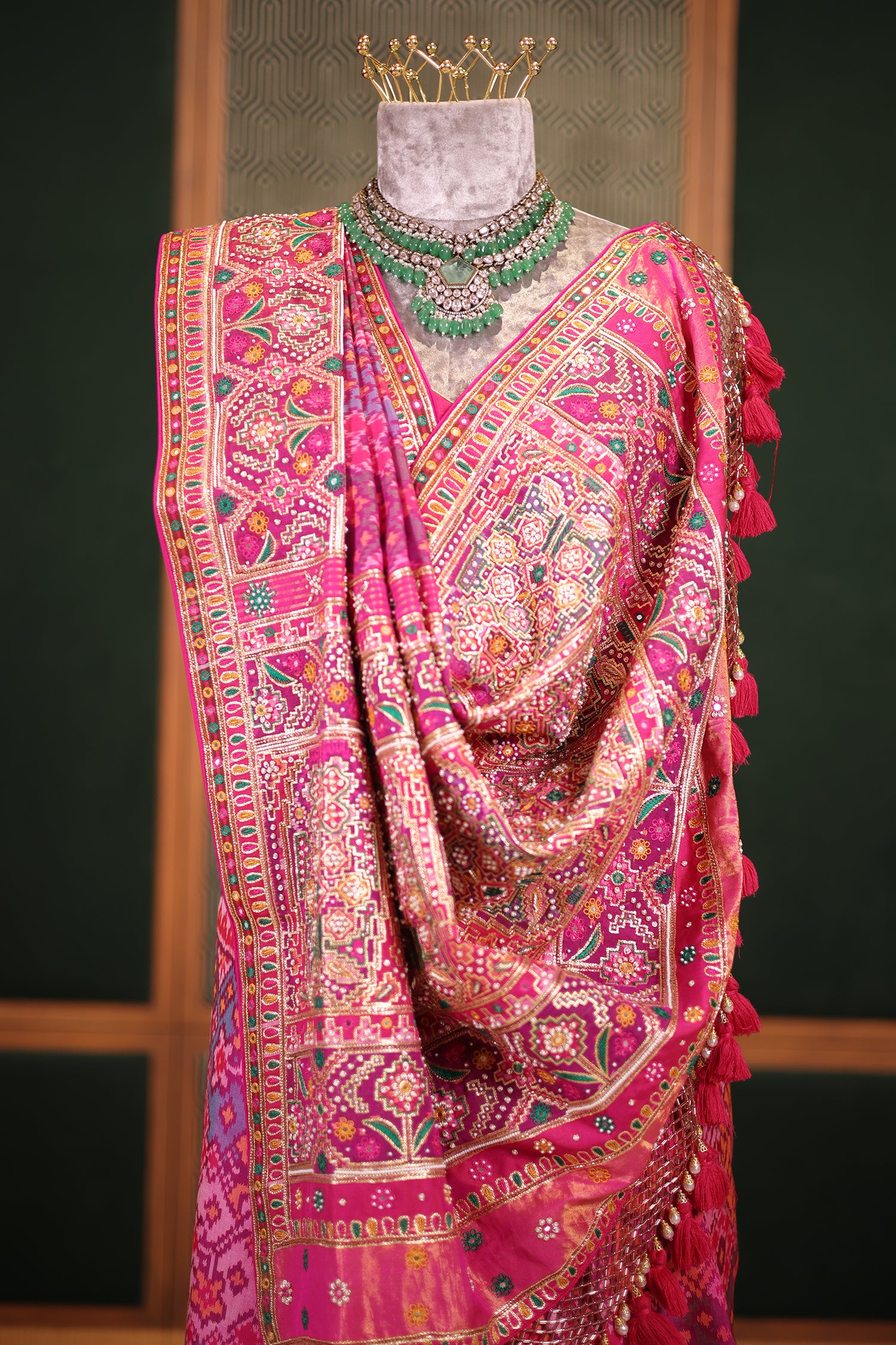 Fuchsia Pink Pure Silk Patola Weave Saree with Ornate Beadwork and Tassel Detailing