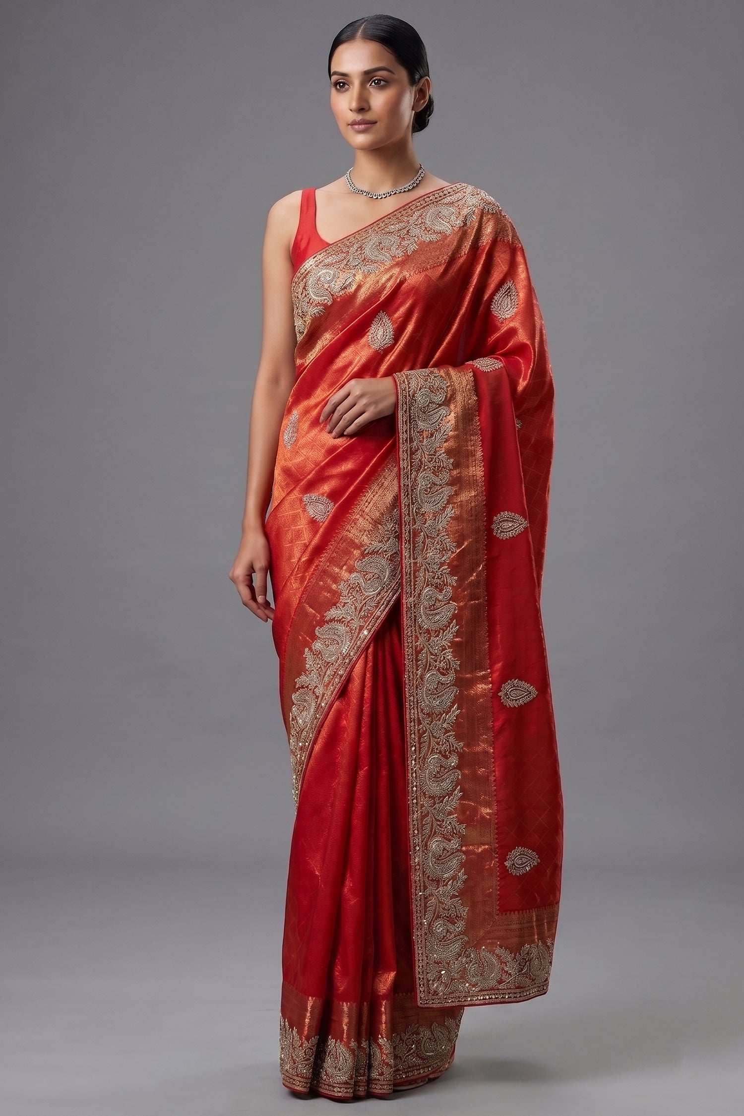 Bridal Red Metallic Kanchipuram Tissue Saree with Intricate Woven Zari and Handcrafted Zardosi and Sequin Embroidered Borders Main image