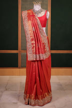 Bridal Red Metallic Kanchipuram Tissue Saree with Intricate Woven Zari and Handcrafted Zardosi and Sequin Embroidered Borders