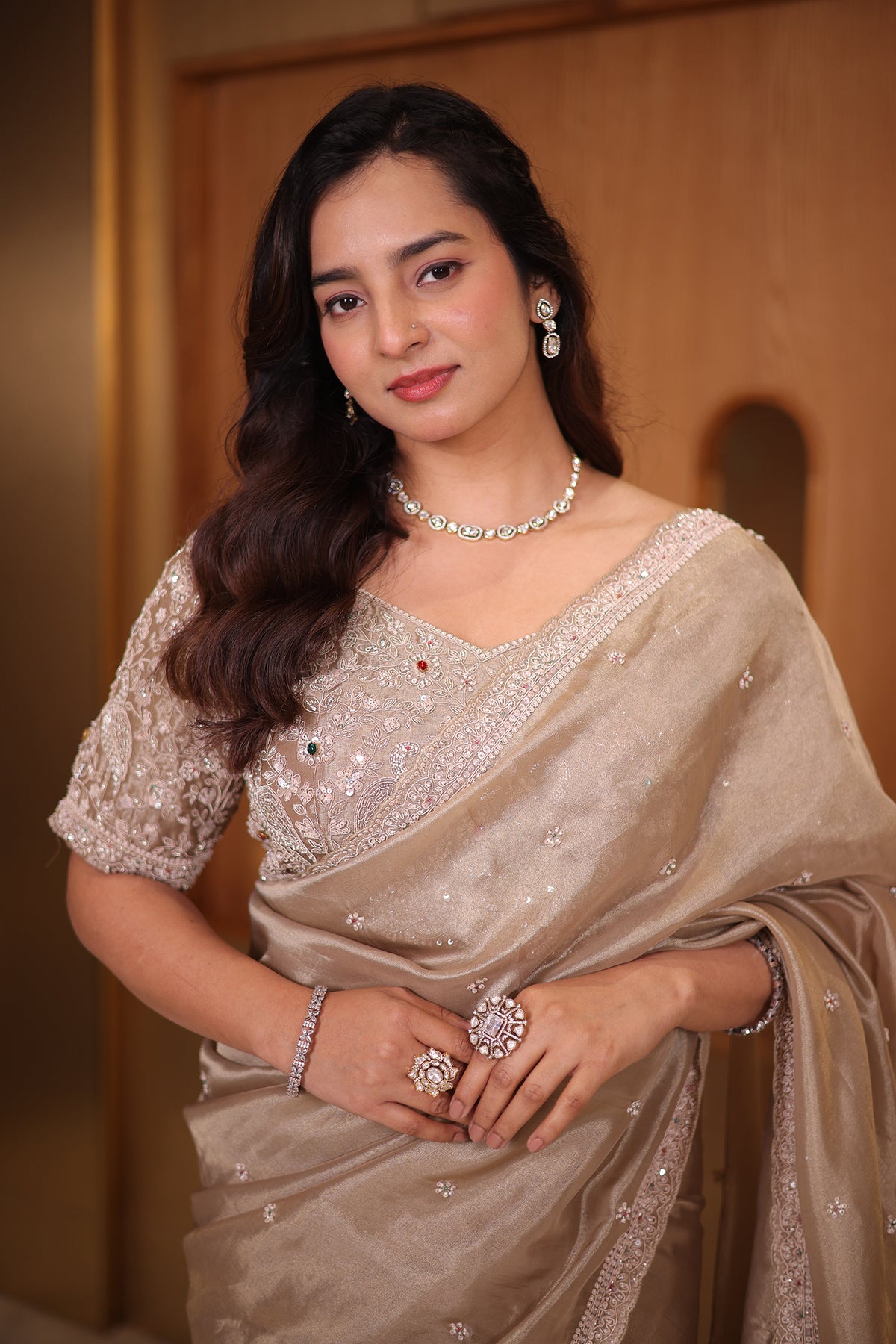 Taupe Premium Organza Saree with Scattered Buttis, Cutdana Bead Work Border, and Coordinated Stitched Blouse