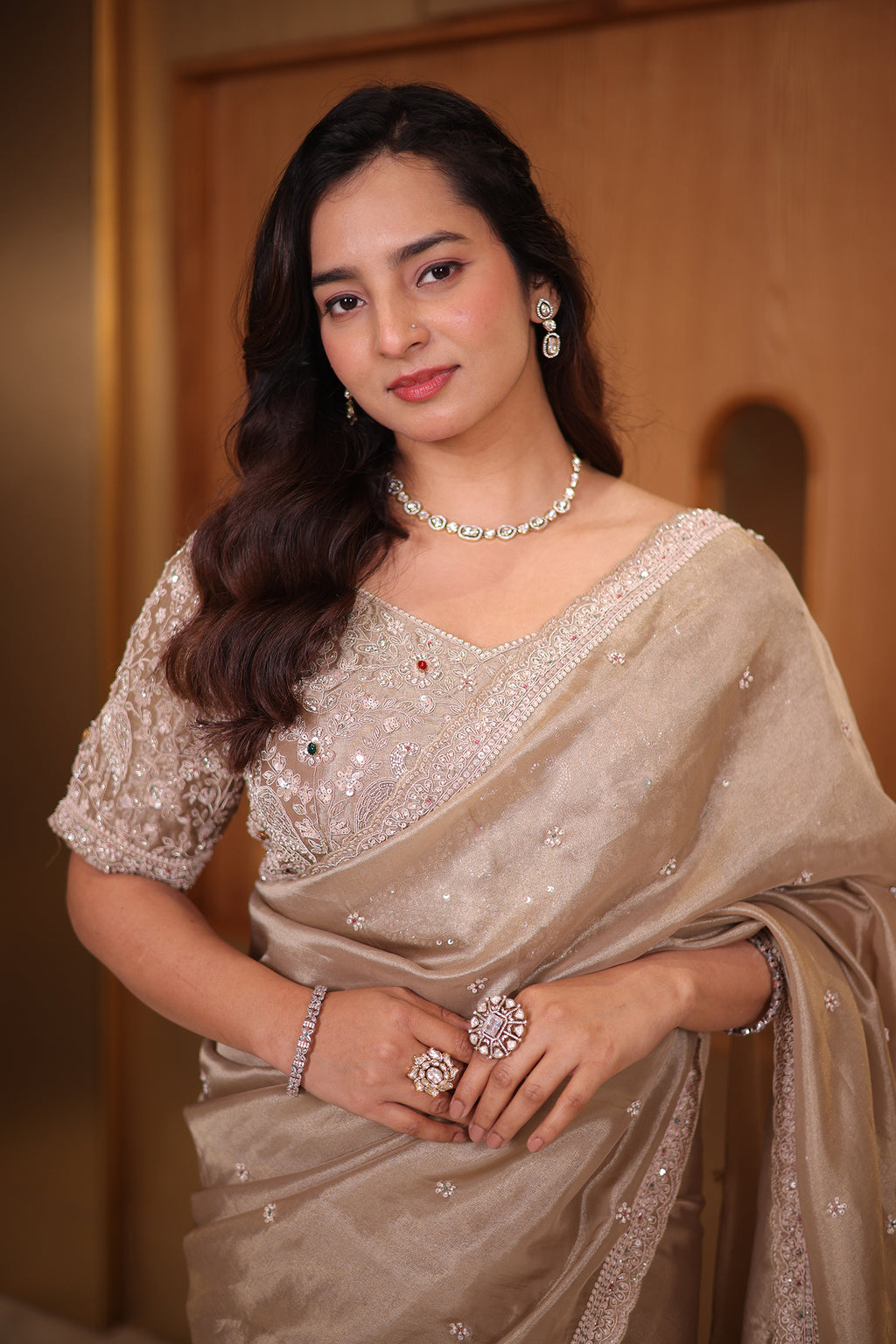 Taupe Premium Organza Saree with Scattered Buttis, Cutdana Bead Work Border, and Coordinated Stitched Blouse