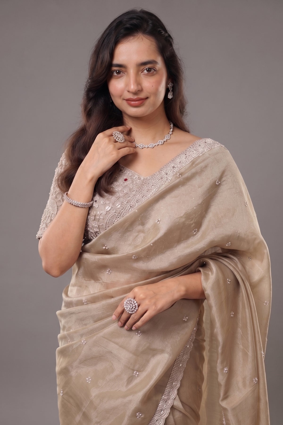 Taupe Premium Organza Saree with Scattered Buttis, Cutdana Bead Work Border, and Coordinated Stitched Blouse