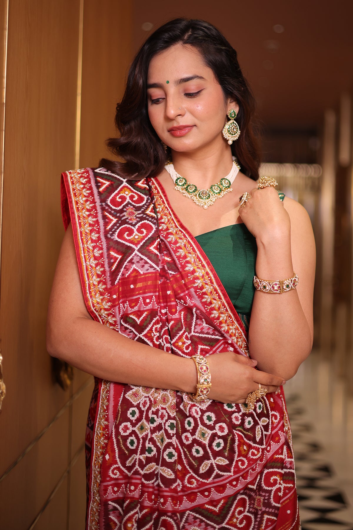 Red Silk Saree with Woven Patola and Handcrafted Cutdana and Bead Work Embroidery