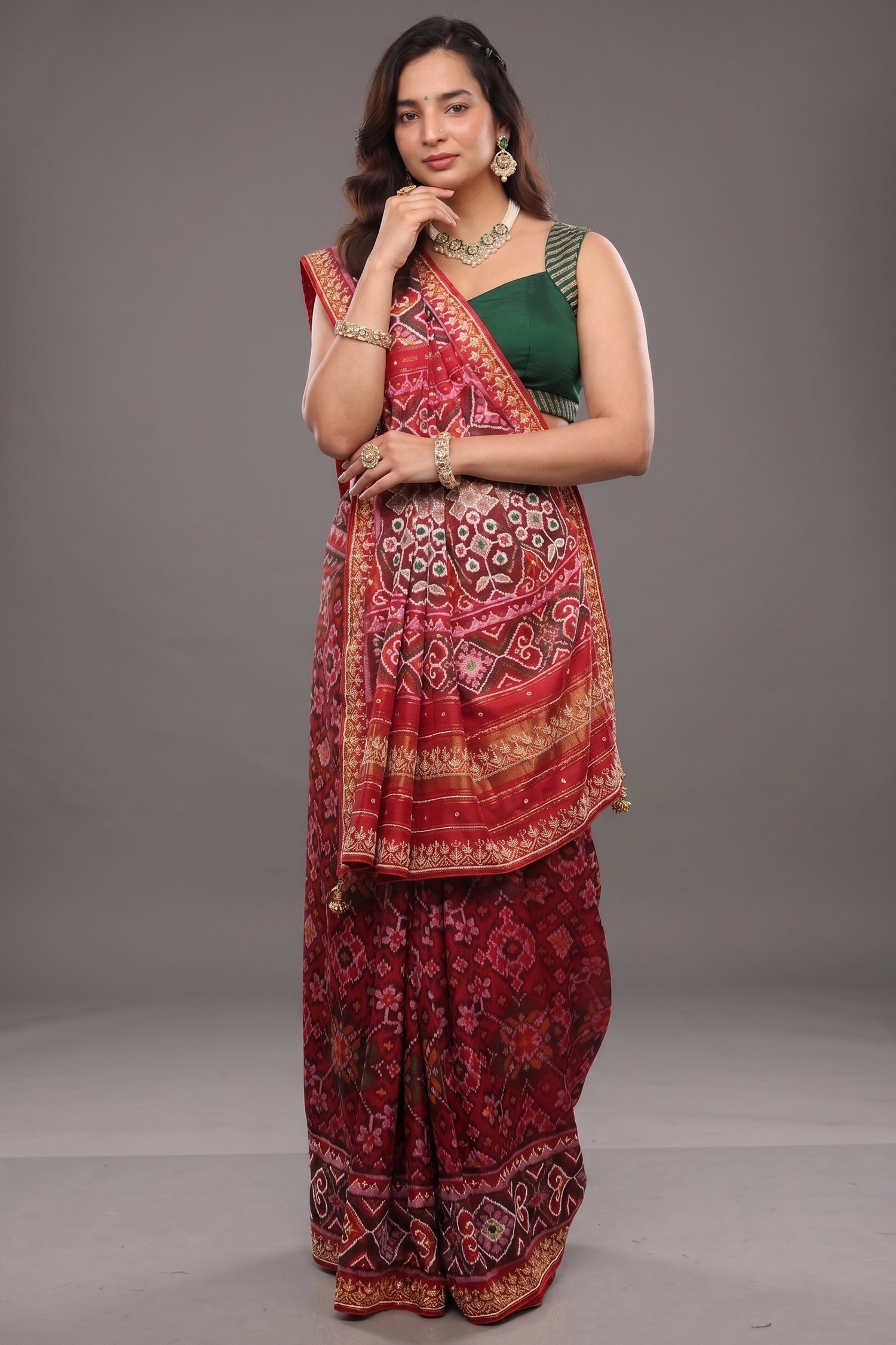 Red Silk Saree with Woven Patola and Handcrafted Cutdana and Bead Work Embroidery Main image