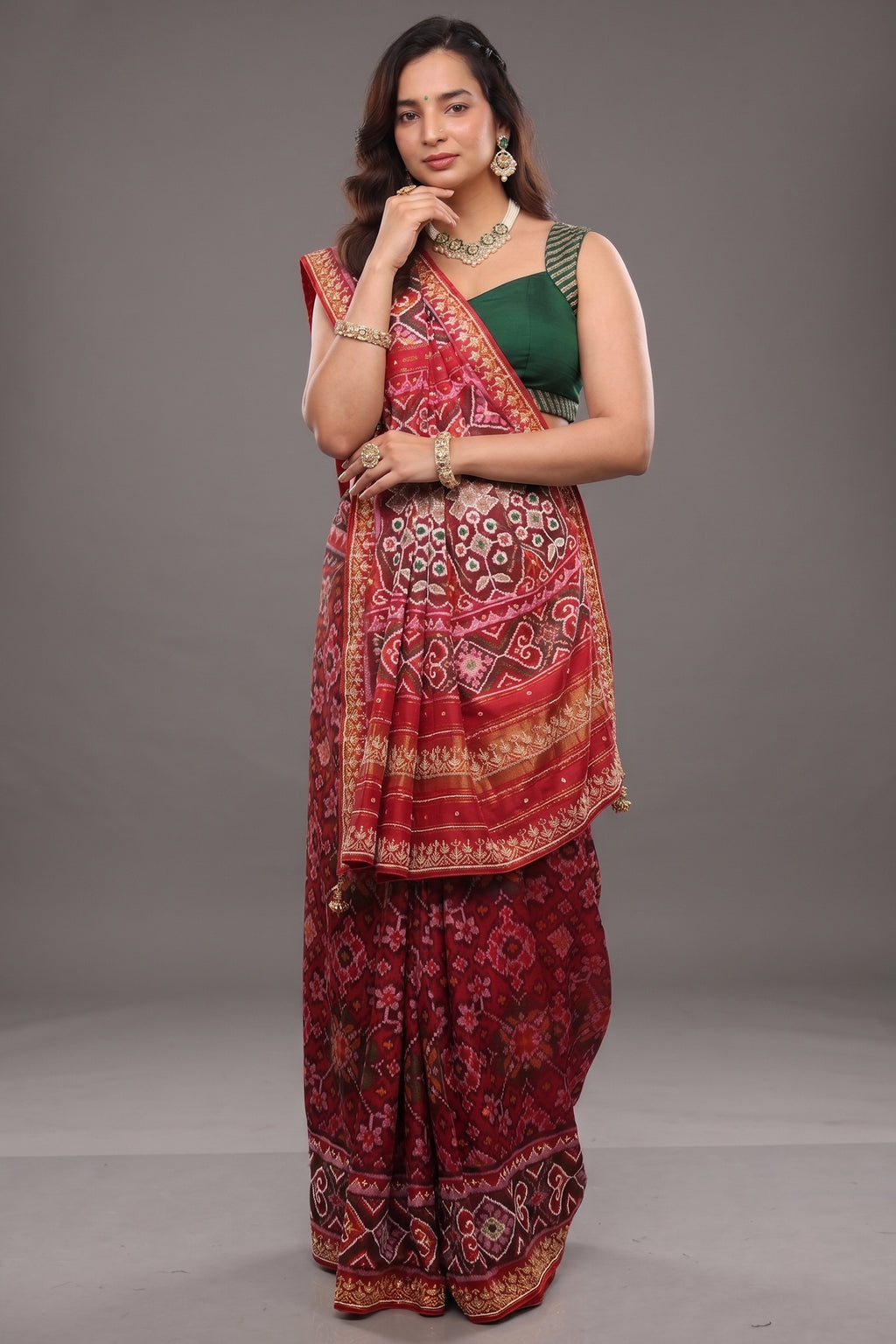 Red Silk Saree with Woven Patola and Handcrafted Cutdana and Bead Work Embroidery