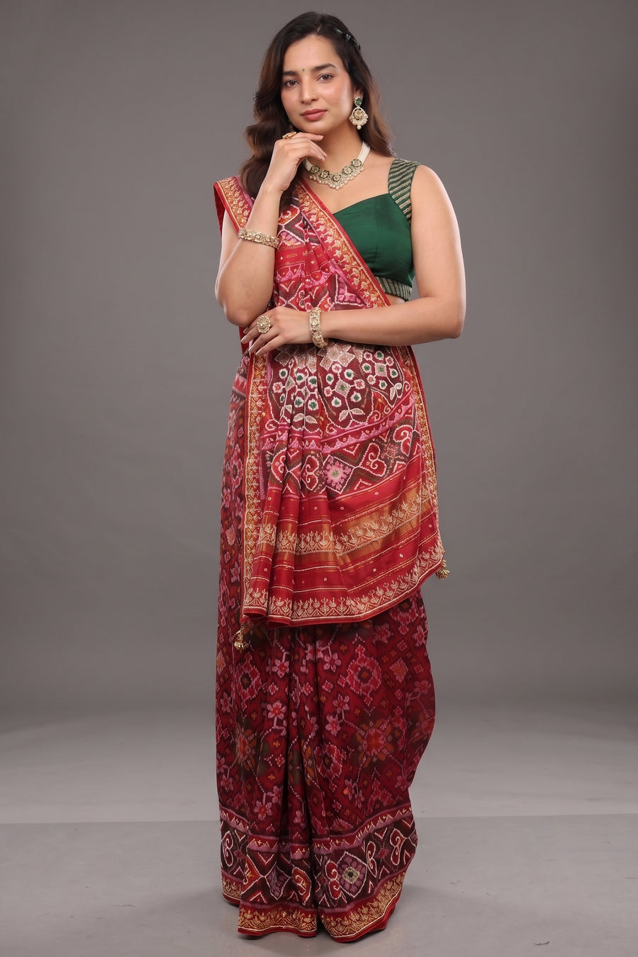 Red Silk Saree with Woven Patola and Handcrafted Cutdana and Bead Work Embroidery