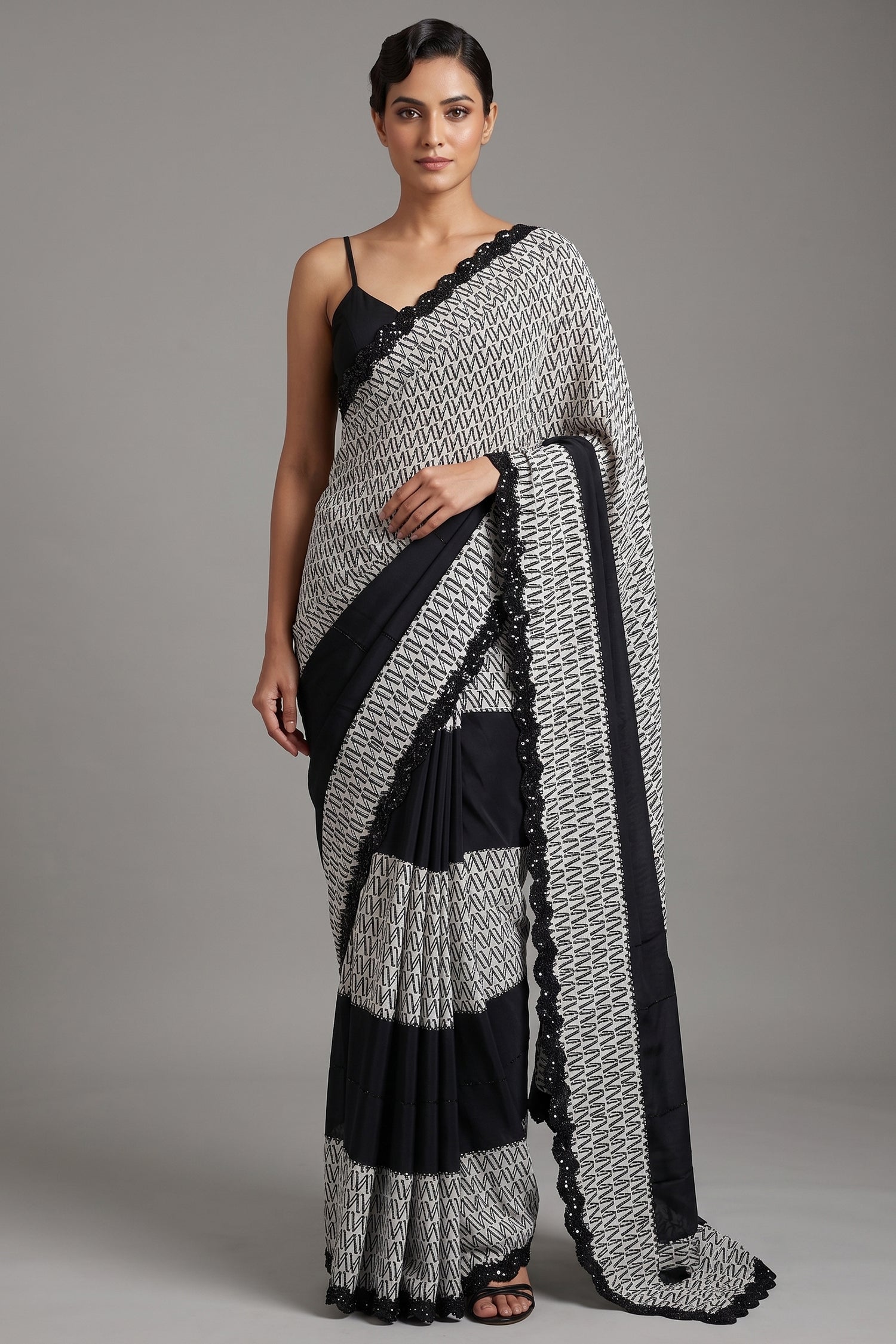Black and White Printed Crepe Silk Saree with Hand-Embellished Sequin and Diamond Accents Main image