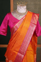 Vibrant Orange Woven Handloom Silk Saree with Fine Butti Work and Ornate Pink Zari Pallu