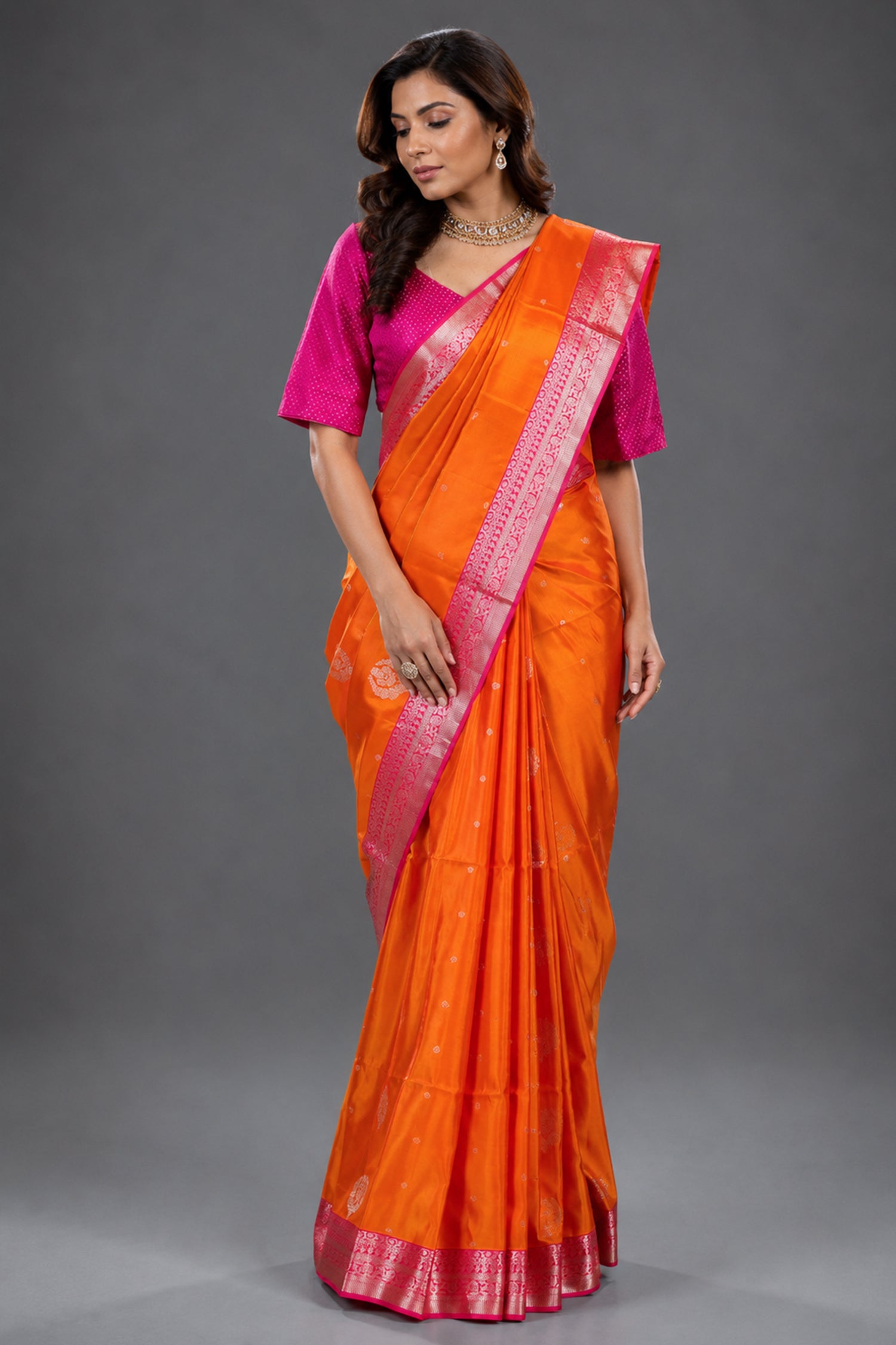 Vibrant Orange Woven Handloom Silk Saree with Fine Butti Work and Ornate Pink Zari Pallu Main image