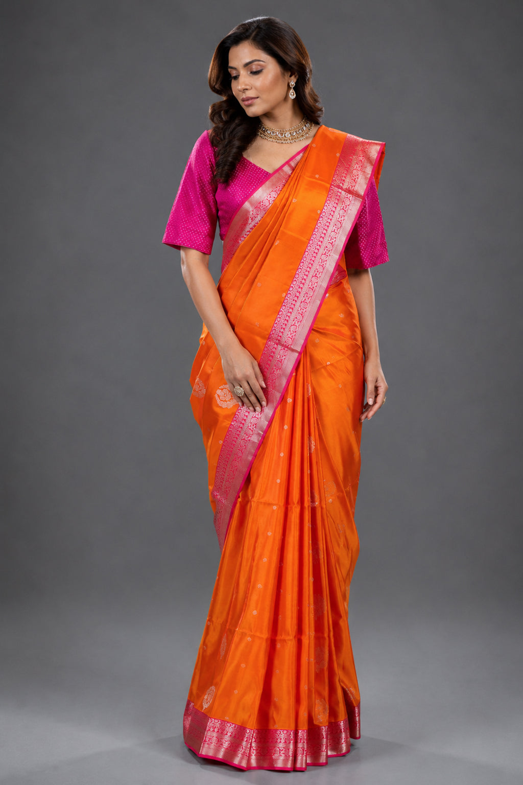 Vibrant Orange Woven Handloom Silk Saree with Fine Butti Work and Ornate Pink Zari Pallu