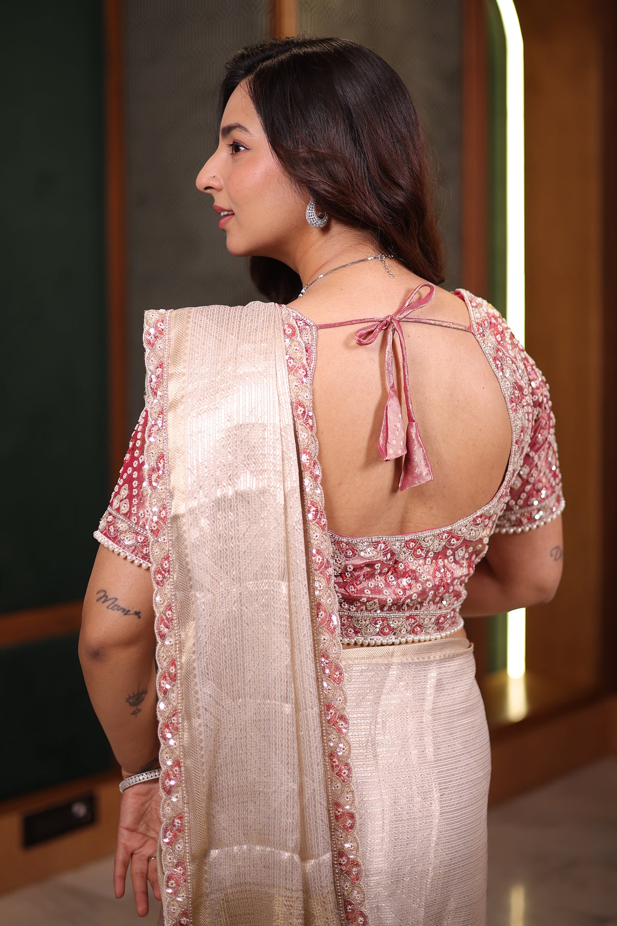 Luminous Ivory Tissue Saree with Scalloped Sequin Border and Heavy Embroidered Pink Tissue Designer Blouse