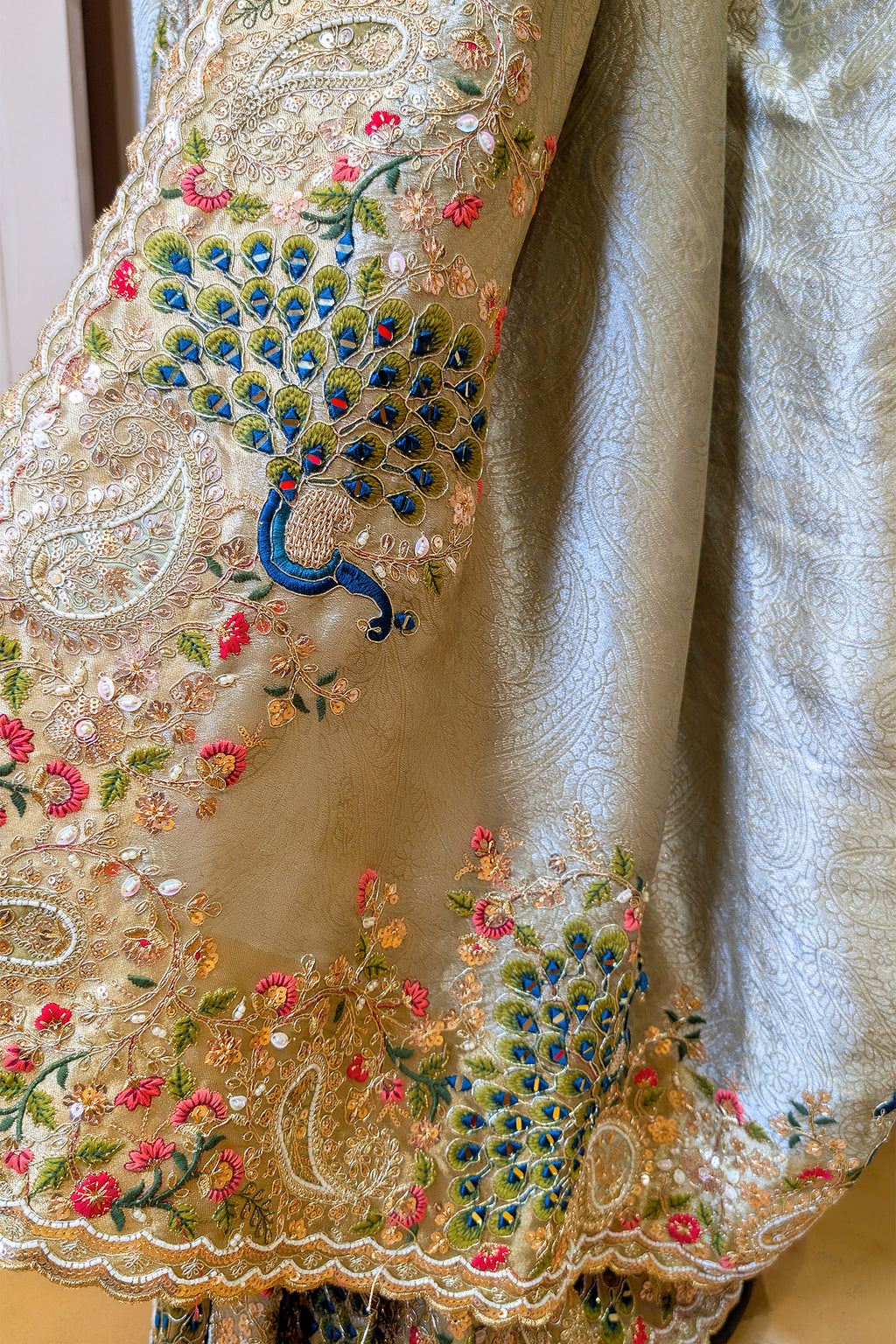 Mint Green Tissue Woven Saree with Handwork Peacock Motif Border