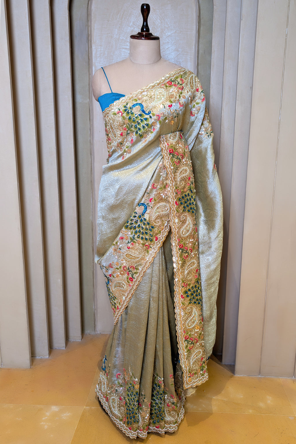 Mint Green Tissue Woven Saree with Handwork Peacock Motif Border