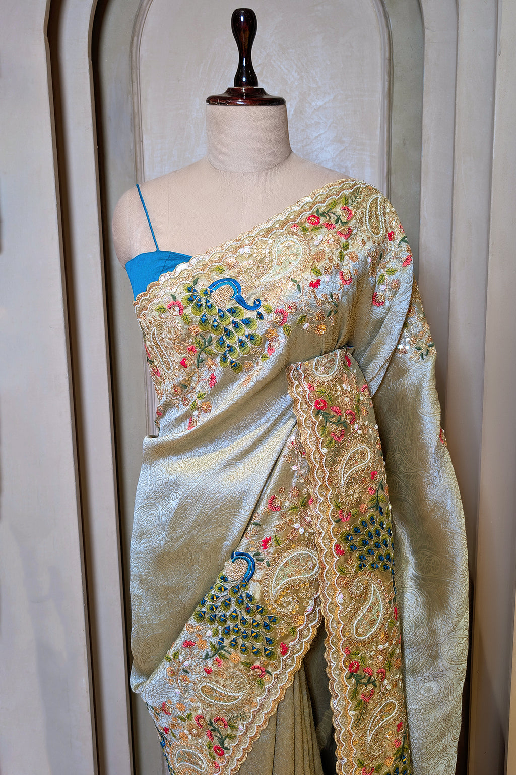 Mint Green Tissue Woven Saree with Handwork Peacock Motif Border