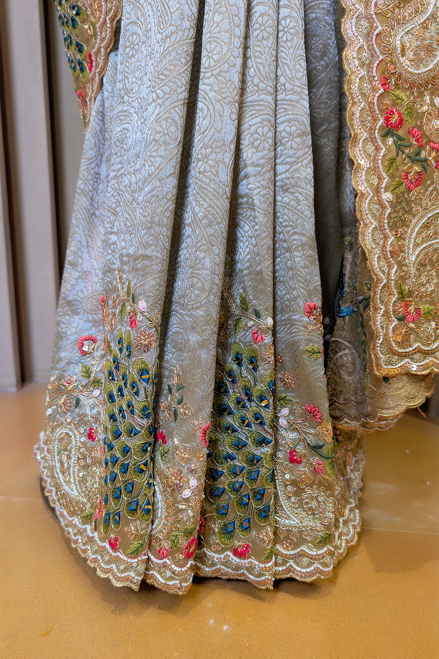 Mint Green Tissue Woven Saree with Handwork Peacock Motif Border