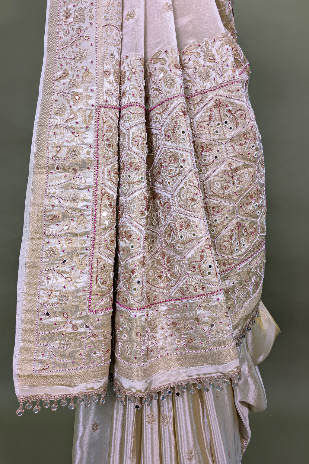 Off White Dola Silk Saree with Woven Bird and Floral Motif Bead Work Border and Pallu