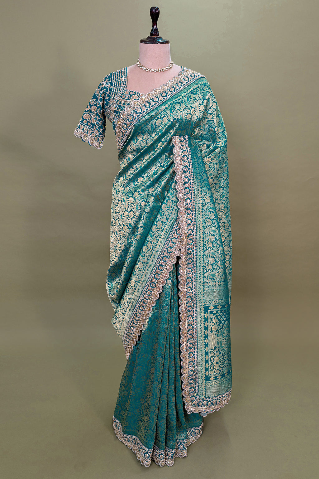 Teal Green Dola Silk Woven Saree with Heavy Work Readymade Blouse