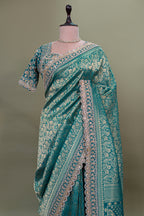 Teal Green Dola Silk Woven Saree with Heavy Work Readymade Blouse