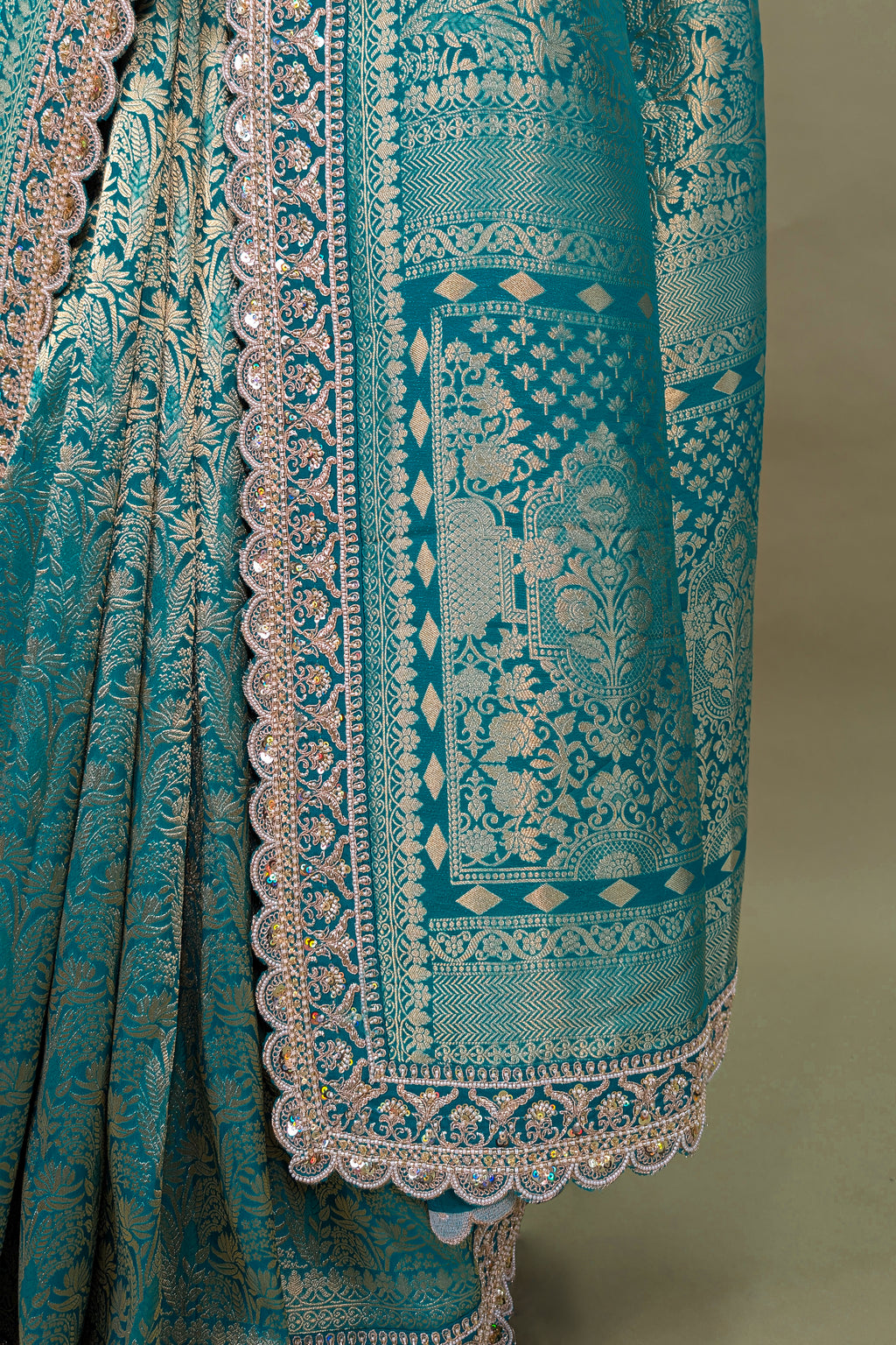 Teal Green Dola Silk Woven Saree with Heavy Work Readymade Blouse