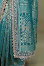 Teal Green Dola Silk Woven Saree with Heavy Work Readymade Blouse