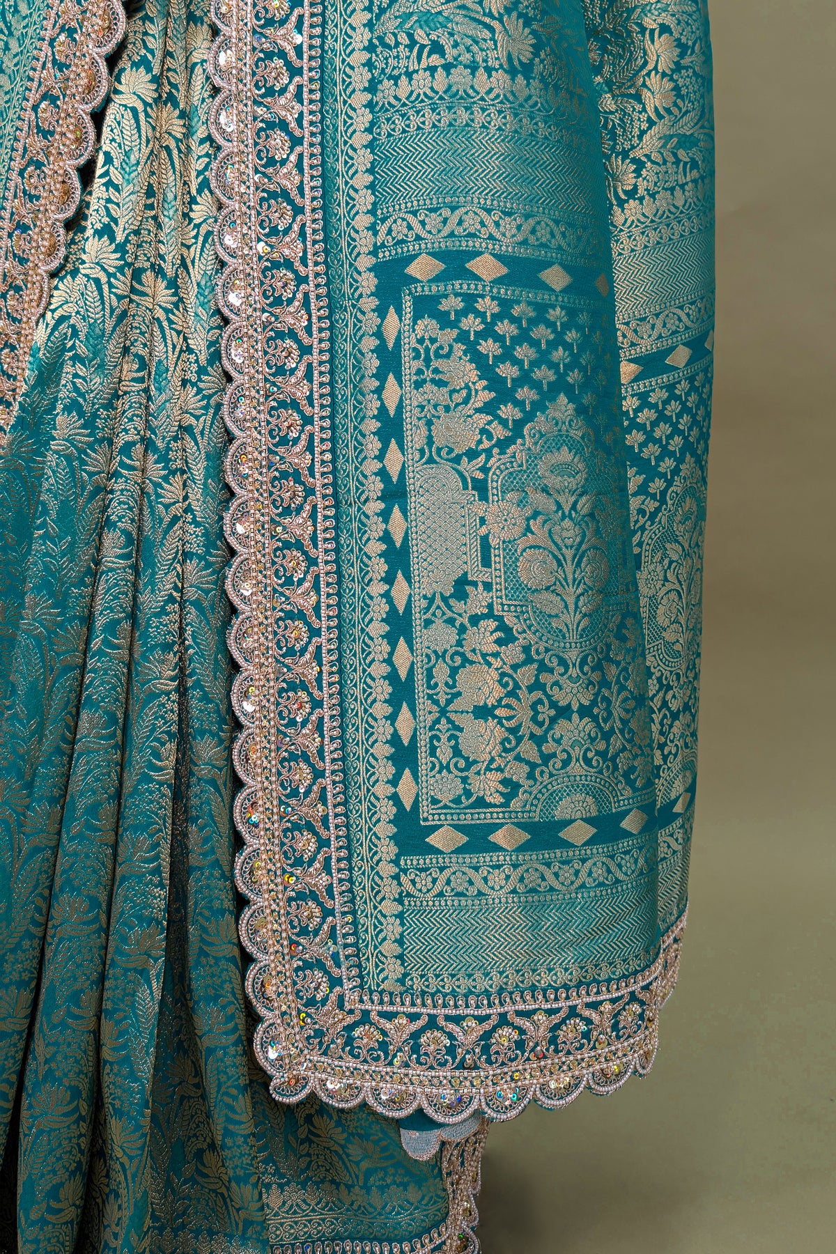 Teal Green Dola Silk Woven Saree with Heavy Work Readymade Blouse