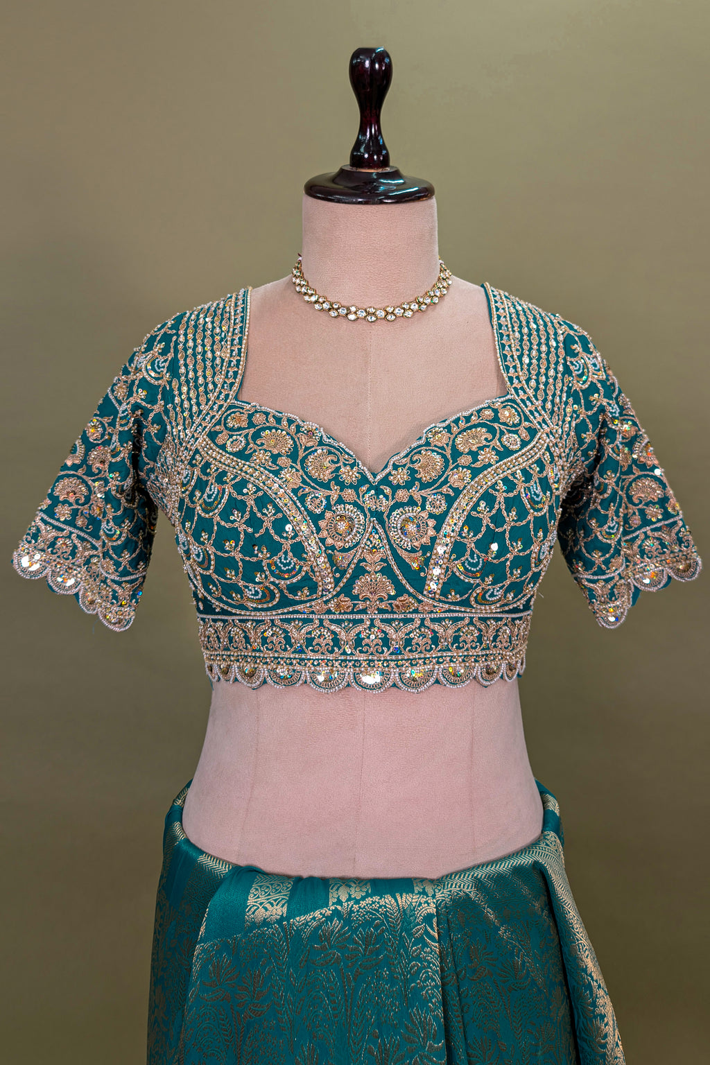 Teal Green Dola Silk Woven Saree with Heavy Work Readymade Blouse