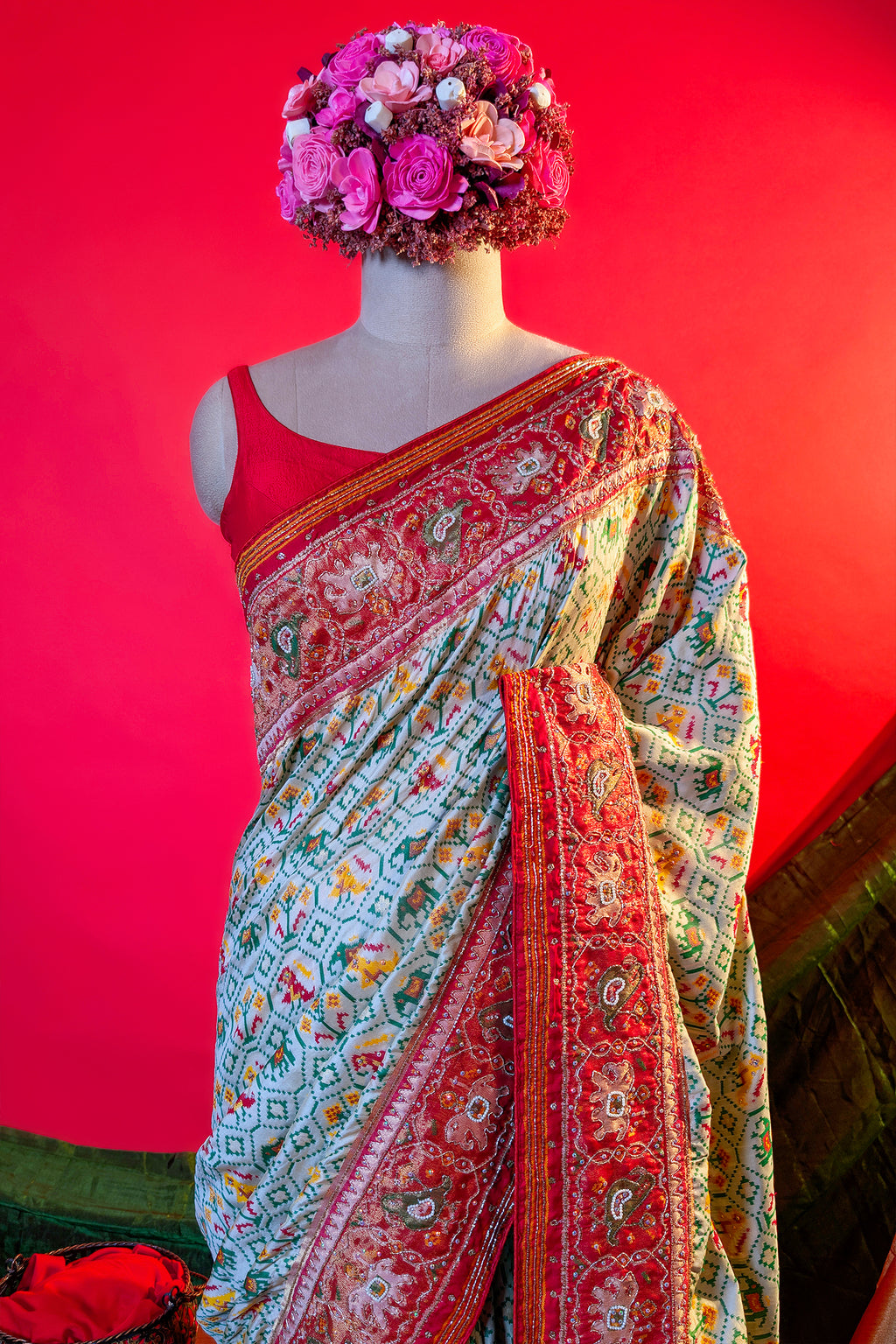 Cream Silk Patola Woven Traditional Saree with Contrast Border and Pallu