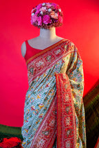 Cream Silk Patola Woven Traditional Saree with Contrast Border and Pallu