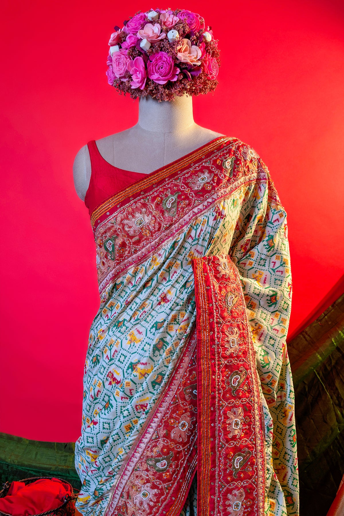 Cream Silk Patola Woven Traditional Saree with Contrast Border and Pallu