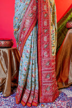 Cream Silk Patola Woven Traditional Saree with Contrast Border and Pallu